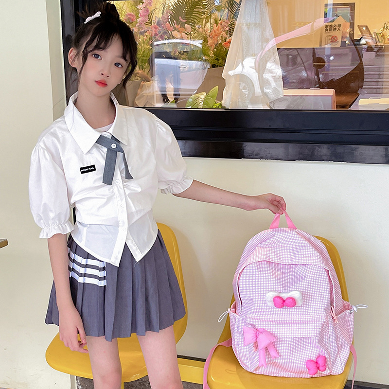 Mochila para niños y niñas a cuadros de estilo occidental, lindo lazo, literario, escuela de escuela primaria, mochila escolar, nueva mochila para niños