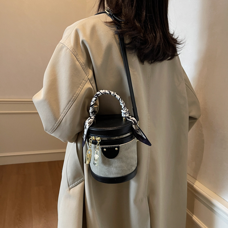 Color contrastante simple bolso de cubo de mano para mujeres 2024 nueva moda versátil mochila mochila de tela extranjera bolso de hombro