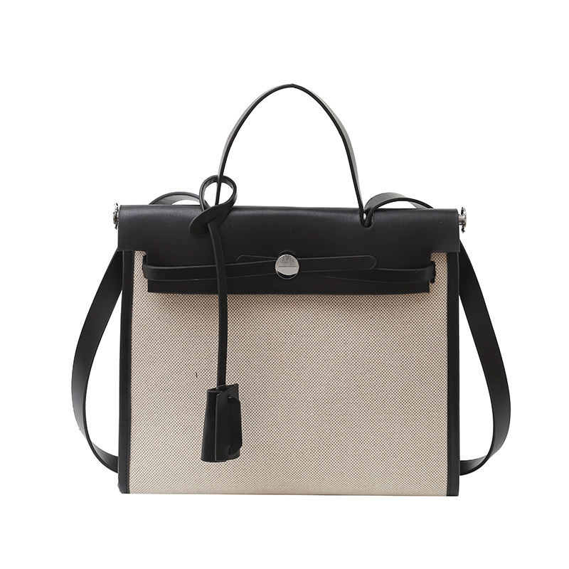 Bolso Carey Tote portátil de alta gama 2025 Nuevo estilo transfronterizo Bolso bandolera de gran capacidad de contraste de lona