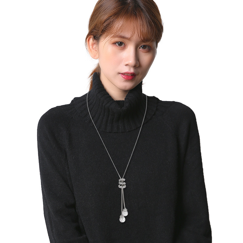 Estilo japonés y coreano envuelto en la cintura Cadena de suéter integral de alta calidad de las mujeres de todo fósforo de moda borla larga cadena de suéter joyería al por mayor