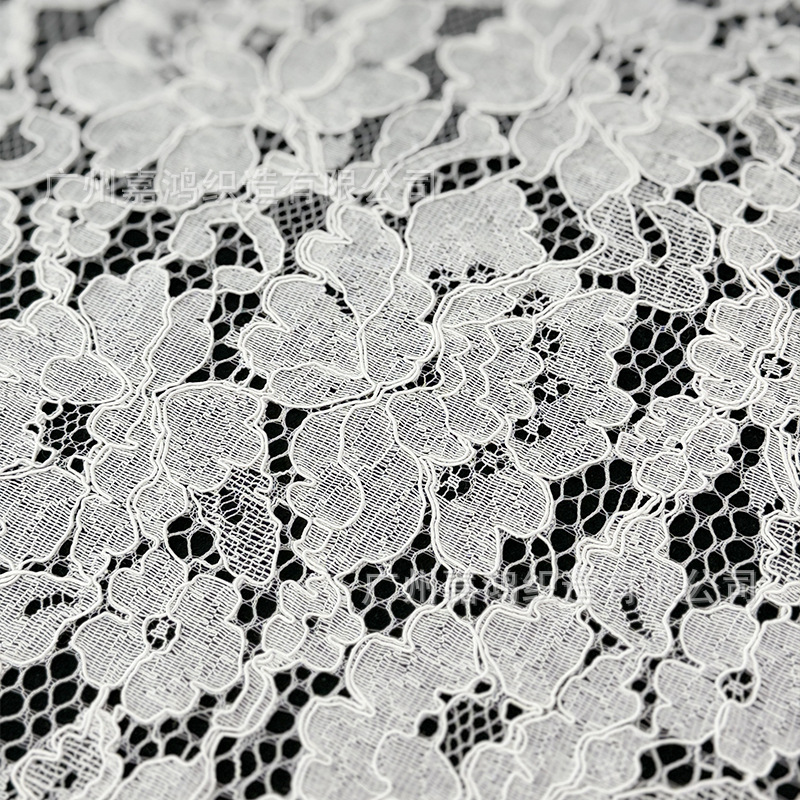 Tejido de encaje de pestañas de hebra 145 * 140cm encaje blanco y negro fábrica de albaricoques en stock de ropa de mujer tela de vestido