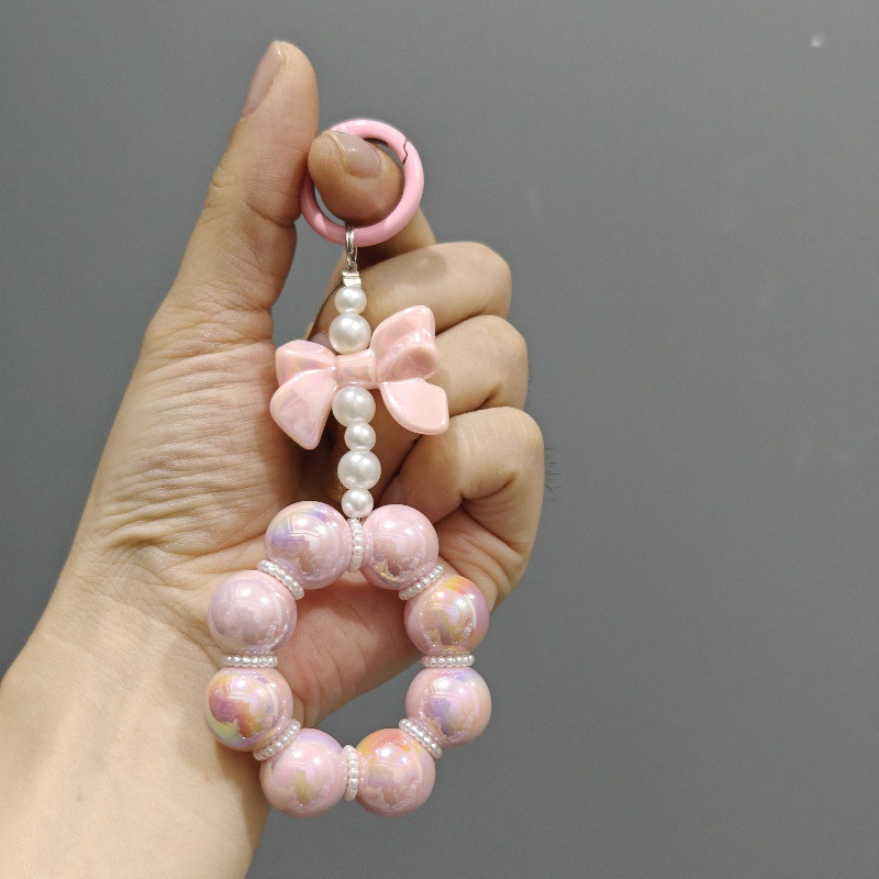 Nueva electrochapado cuentas arco llavero del coche colgante lindo caramelo color pintura anillo de perlas accesorios bolsa Decoración
