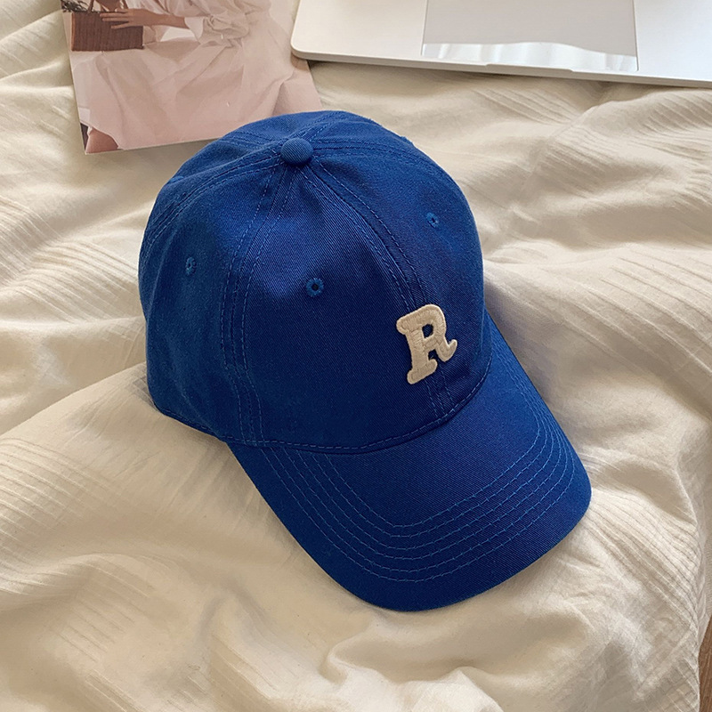 Gorra de béisbol estilo coreano circunferencia de la cabeza grande cara-mirando pequeño sombrero hombres y mujeres pareja moda todo partido letra R gorra al por mayor