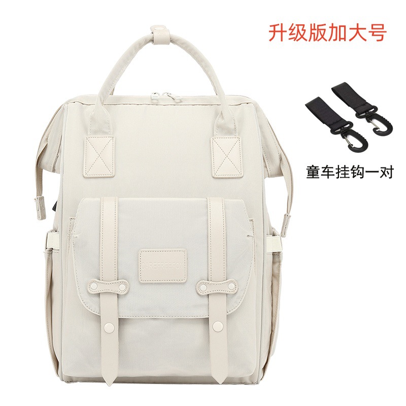 安心狐多機能マミーバッグ大容量ファッション外出母子バッグ宝母が人形を持って出かけるバックパック
