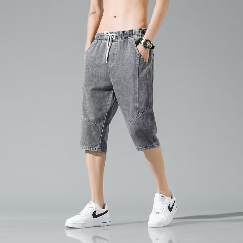 Moda verano mezclilla tendencia de los hombres sueltos rectos tallas grandes pantalones recortados marca de moda de los hombres pantalones medios de 7 puntos estilo fino de verano