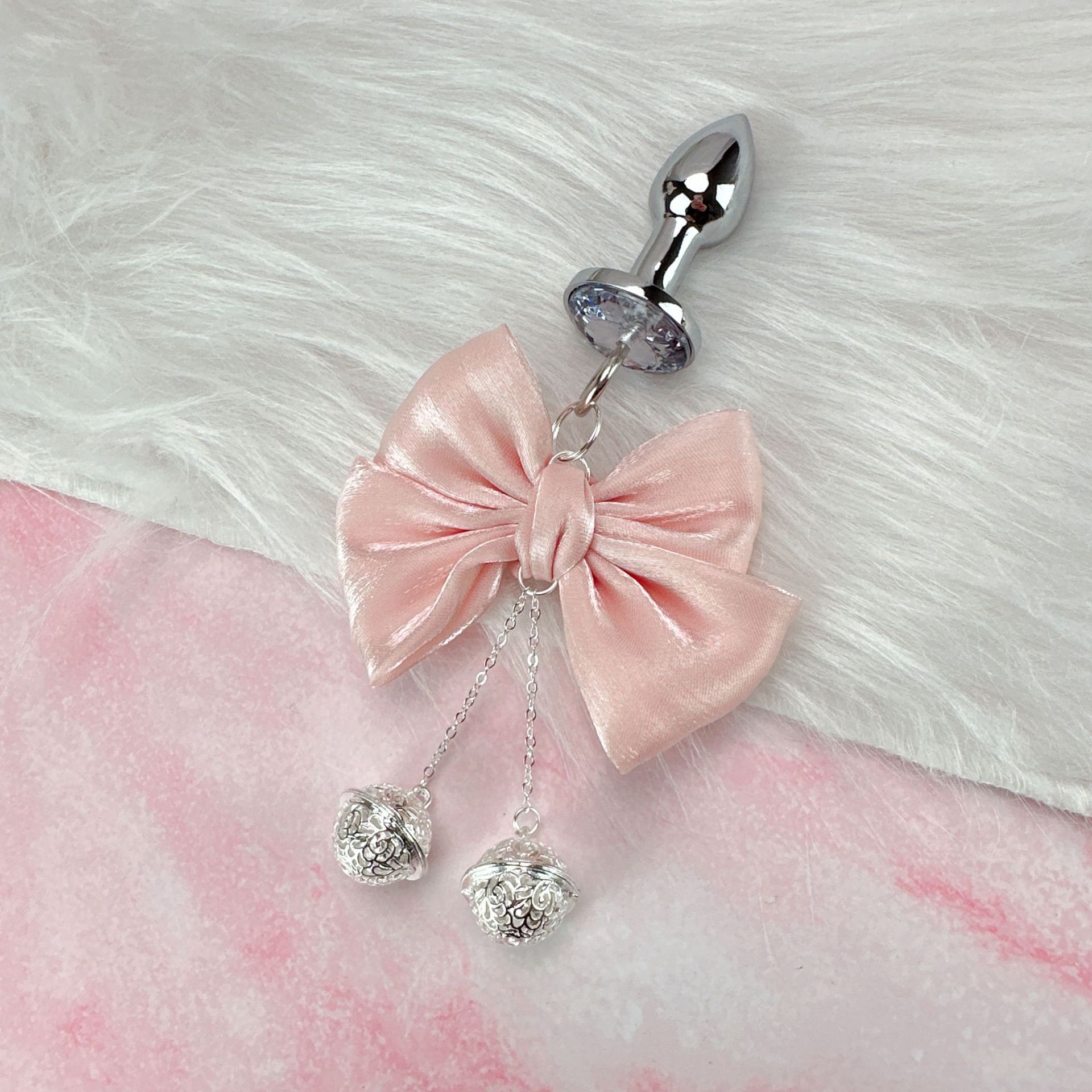 Fábrica directa de artículos sexuales SM esclavo femenina arco de cuentas cadena de leche clip pareja coqueteo artículos de venta