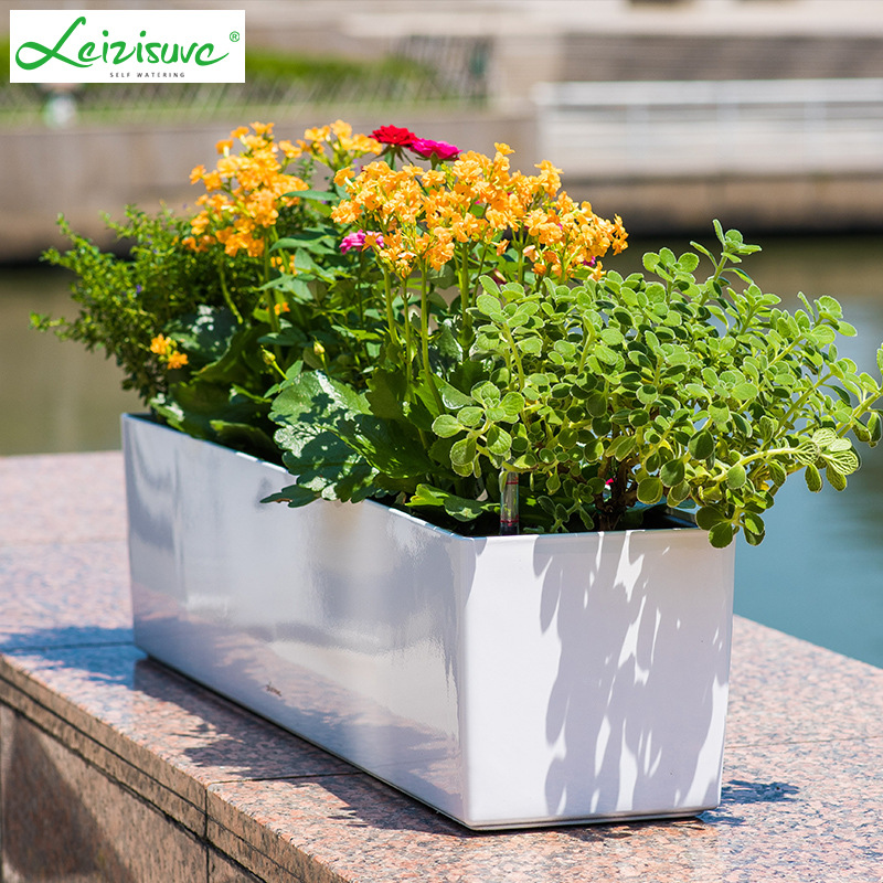 Laizhixiu perezoso maceta rectangular pintura resina balcón automático absorbente plástico perezoso maceta al por mayor