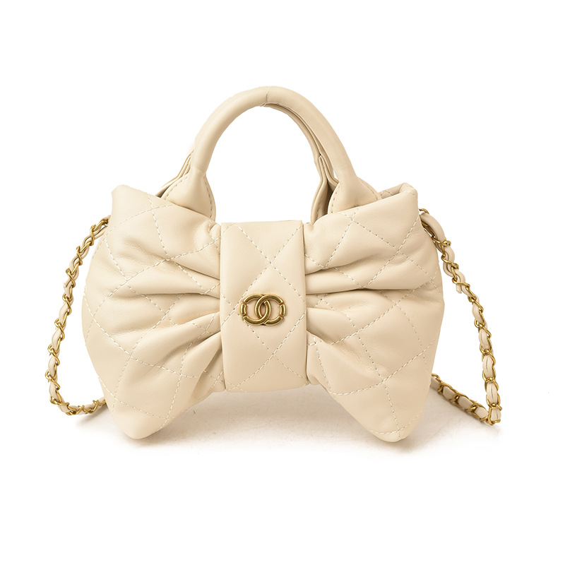 Bolsa de mano de chicas arco dulce cadena de diamante pliegue bolso de hombro 2026 nuevo bolso infantil transfronterizo
