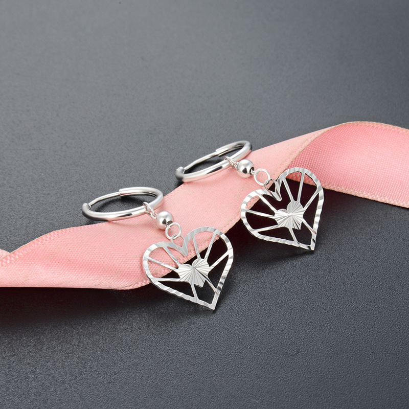 Pendientes personalizados estilo fresco estilo japonés y coreano s925 plata coche flor pendientes transfronterizos accesorios creativos en forma de corazón pendientes para mujeres