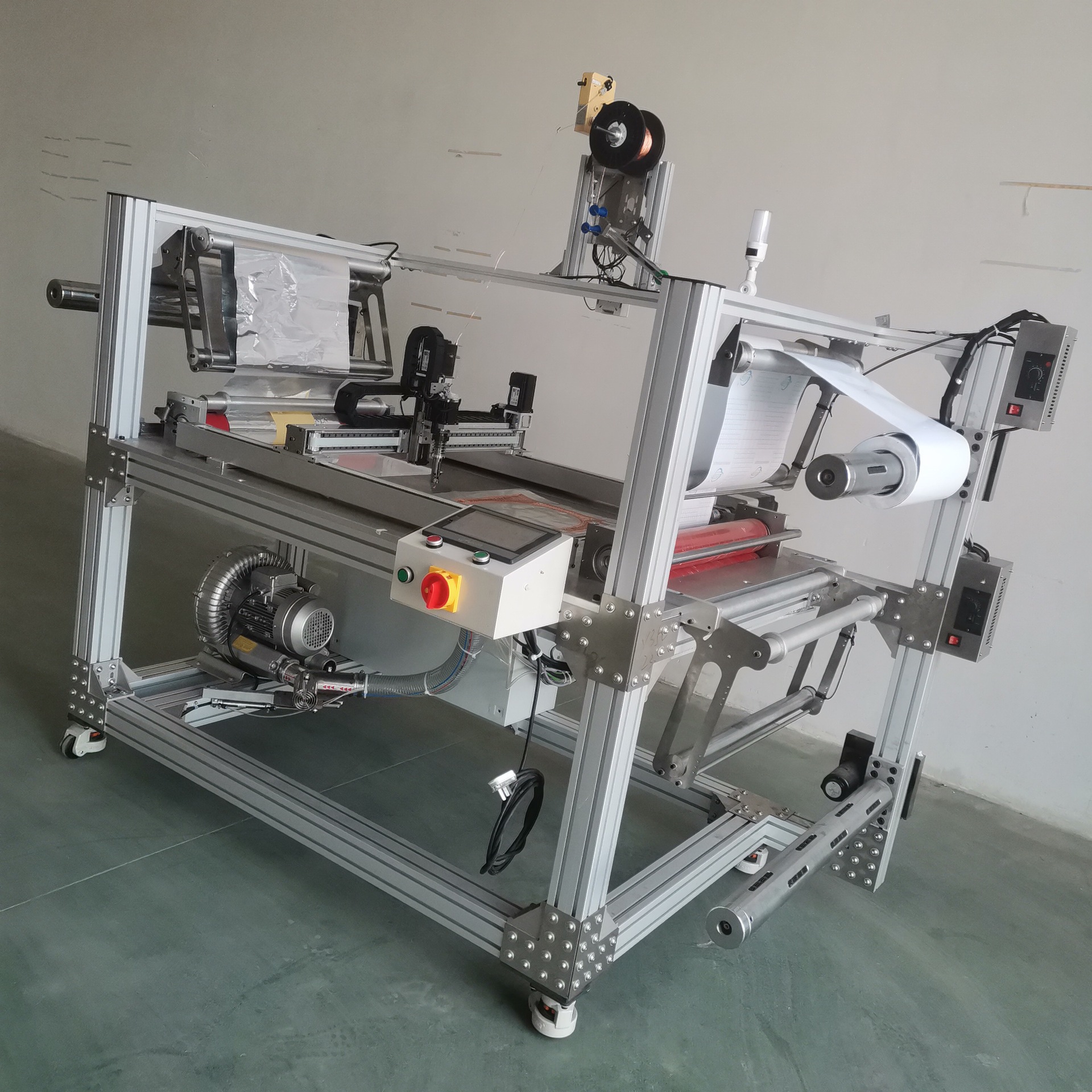 Máquina de Laminado y Fijación de Hilo Calefactor, para Fijación Térmica
