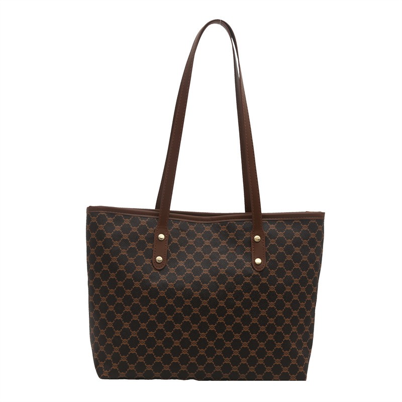 Bolso Tote personalizado de paso relajado de gran capacidad 2025 nuevo hermoso bolso de hombro de moda de nicho con textura bolso femenino