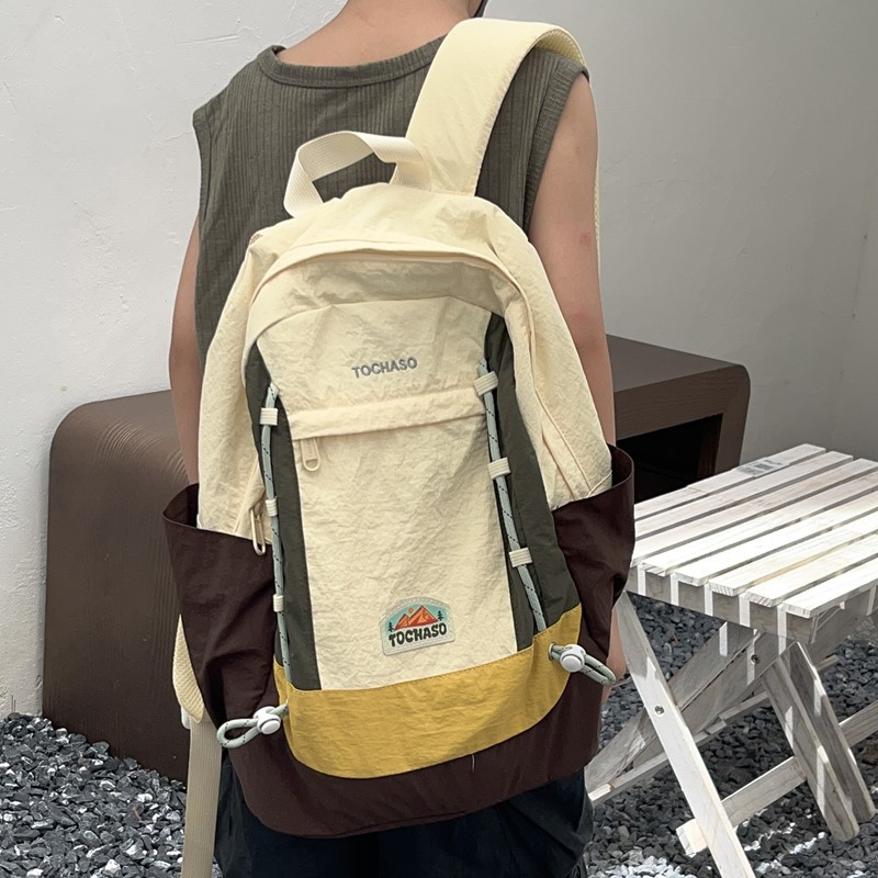 Mochila de moda coreana para niños y niñas, mochila de alta capacidad para estudiantes de escuela primaria, nueva mochila para niños con cuerda extranjera.