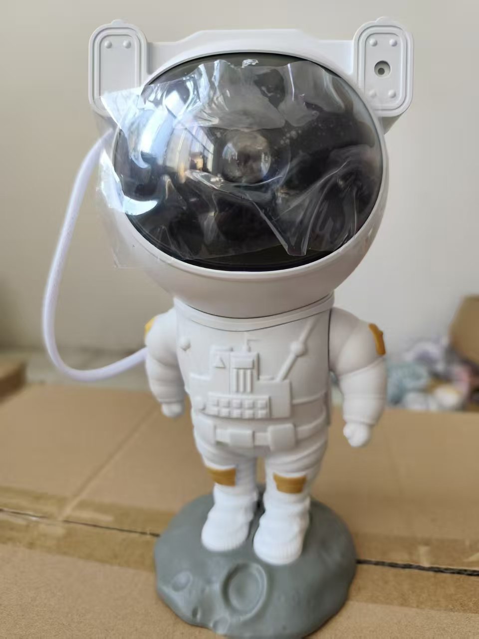 Nuevo proyector de lámpara de estrellas de cohete transfronterizo con atmósfera de estrellas creativas de astronautas láser de proyección de estrellas