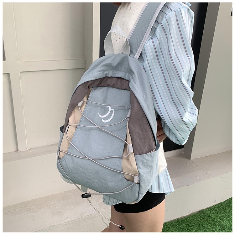 Nueva mochila deportiva al aire libre de doble hombro coreana mochila para estudiantes de secundaria