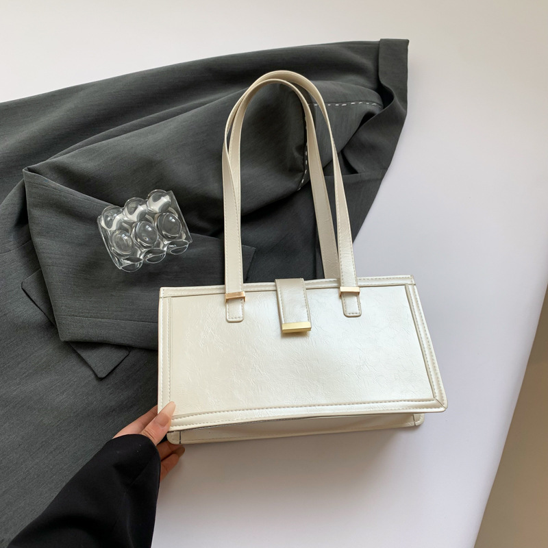 2024 otoño nuevo estilo retro tendencia de viaje bolso cuadrado minimalista diseño de moda personalidad brazalete bolso de hombro