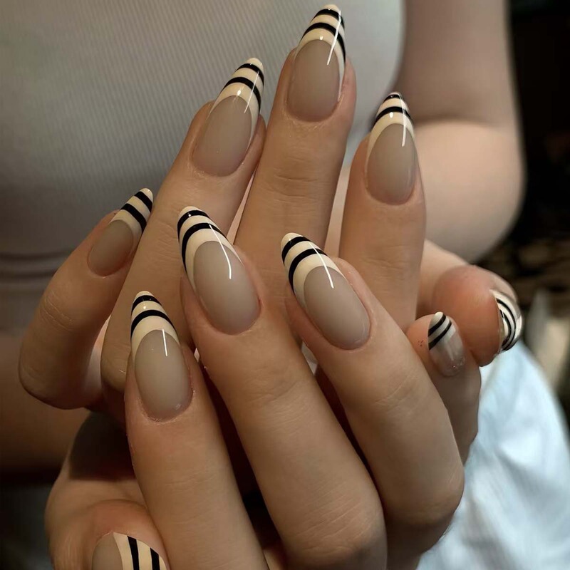 High-end Korean minimalist style black and white striped French press-on nails, almond-shaped pointed nails, niche cool nude color manicure High-end Korean minimalist style black and white striped French press-on nails, almond-shaped pointed nails, niche cool nude color manicure