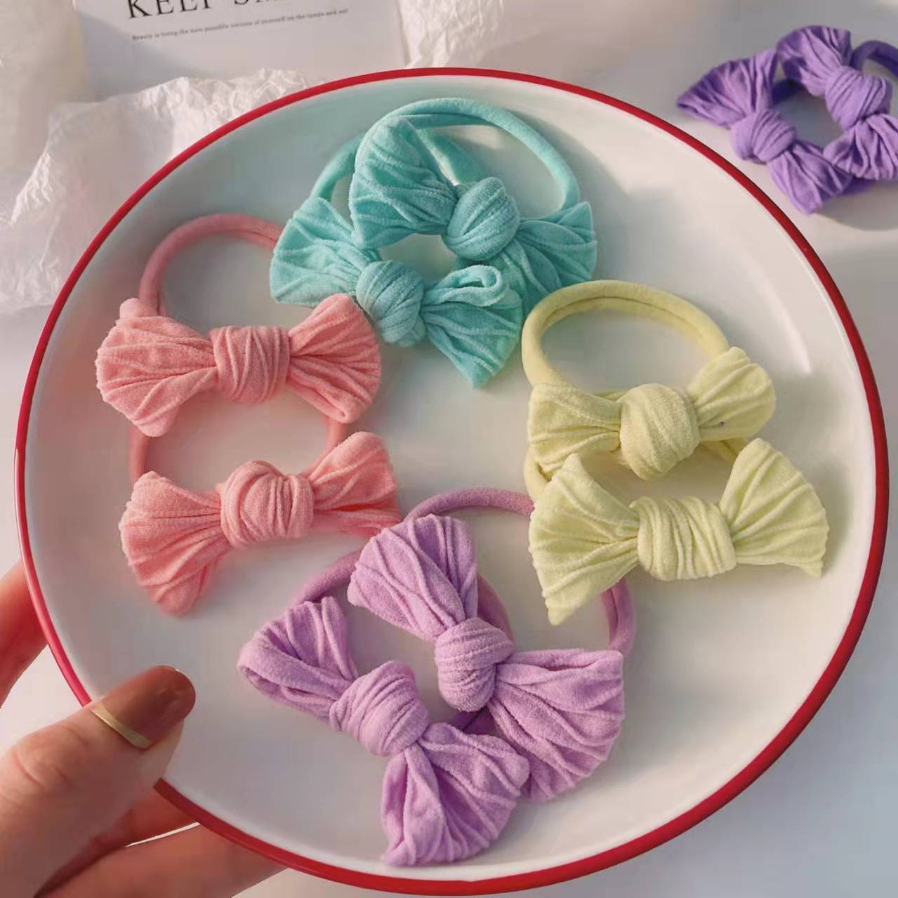 Banda de pelo de color caramelo de alto aspecto banda cuerda 2022 nuevo color cuerda de pelo popular en línea popular banda de goma para mujeres