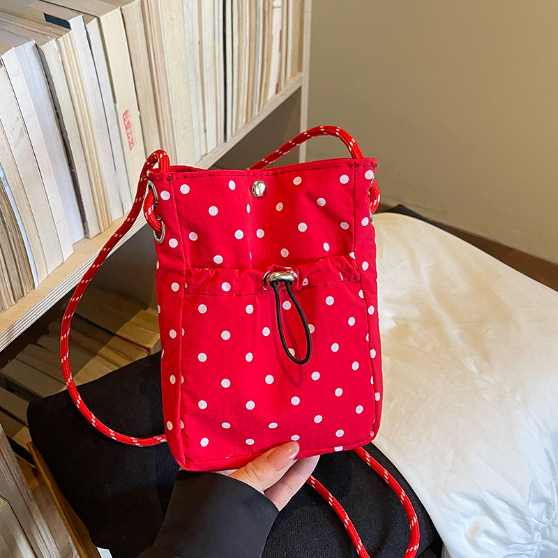 Korean-style ins polka dot niche backpack for women, 2026 new model, high-end and stylish, suitable for students and commuting, lightweight small backpack
