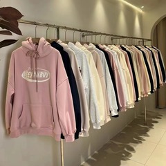 韓国版のゆったりとしたベルベットは、帽子付きのセーターの女性モデル秋十三行ブランドの婦人服卸売りの手の供給源を厚くした