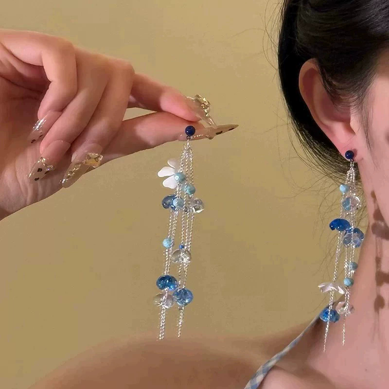 2026 viento falso sensación de atmósfera super inmortal pendientes de flores de malla temperamento suave de chiffon para mujeres pendientes