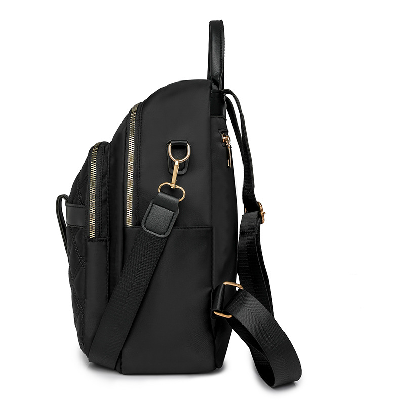 Mochila para mujer 2024 nueva mochila de viaje de ocio de nailon de la moda coreana de todo fósforo