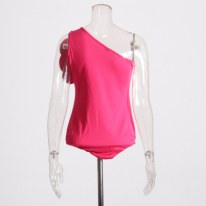 2024 verano nuevo europeo y americano hombro oblicuo diseño tridimensional flor costura sin mangas color sólido mono sexy moda ropa de mujer