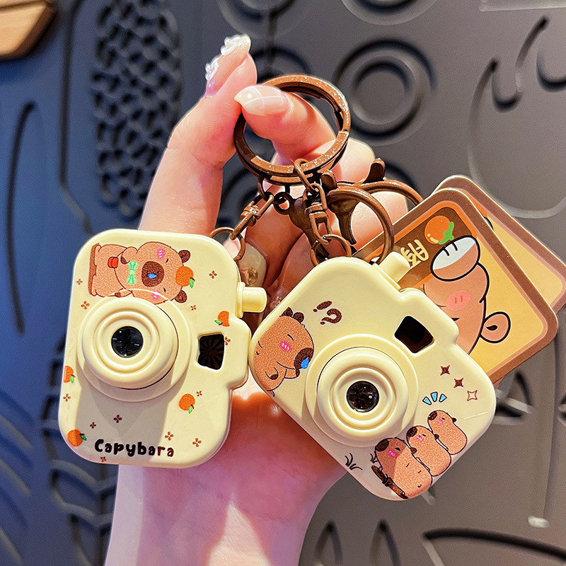 Original Capibala luminous projection camera keychain cute cartoon capybara bag pendant small gift Original Capibala luminous projection camera keychain cute cartoon capybara bag pendant small gift