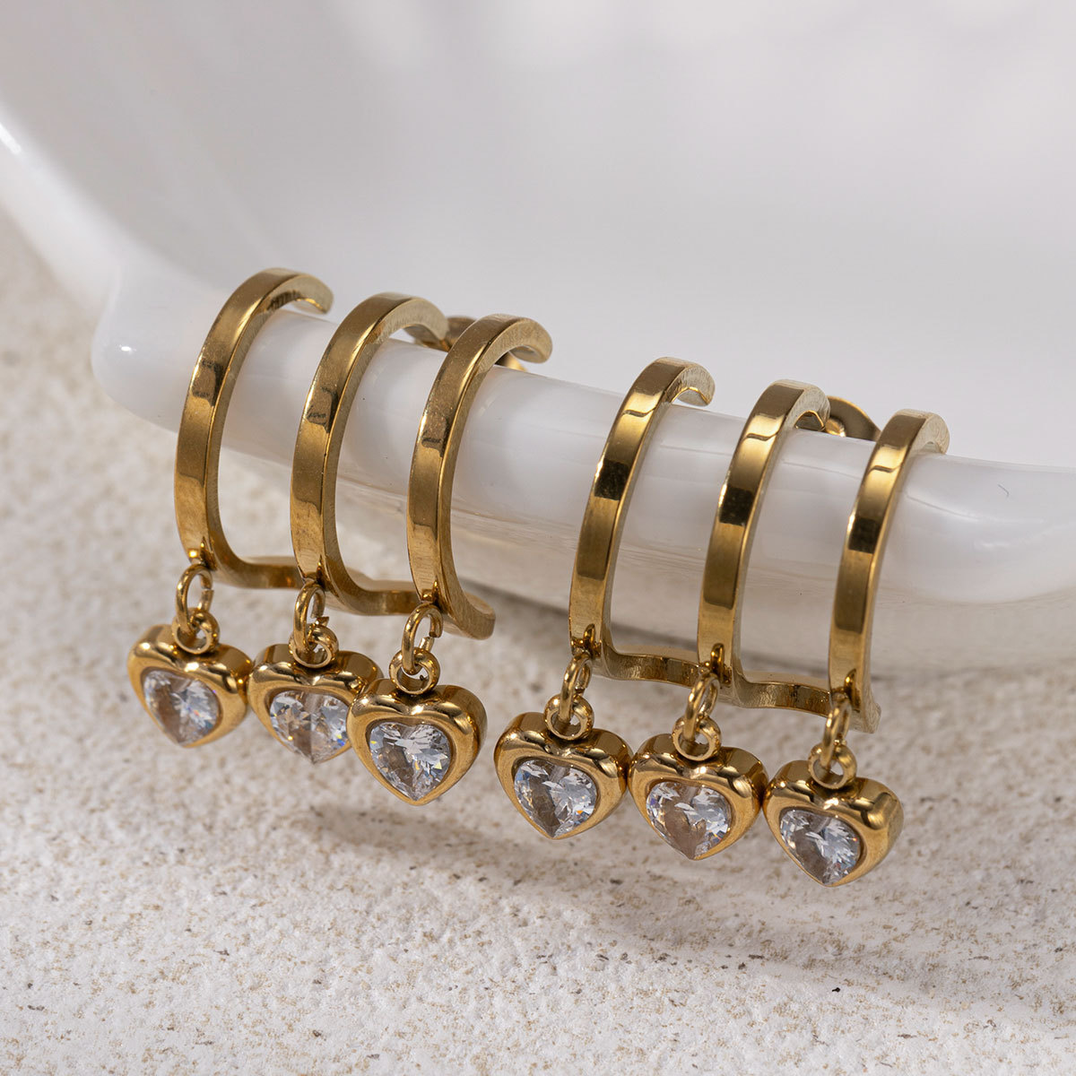 Taina europa y americana pendientes de acero inoxidable para mujeres lujosas de alto nivel amor colgante oro y plata de acero de titanio de dos colores joyas de orejas