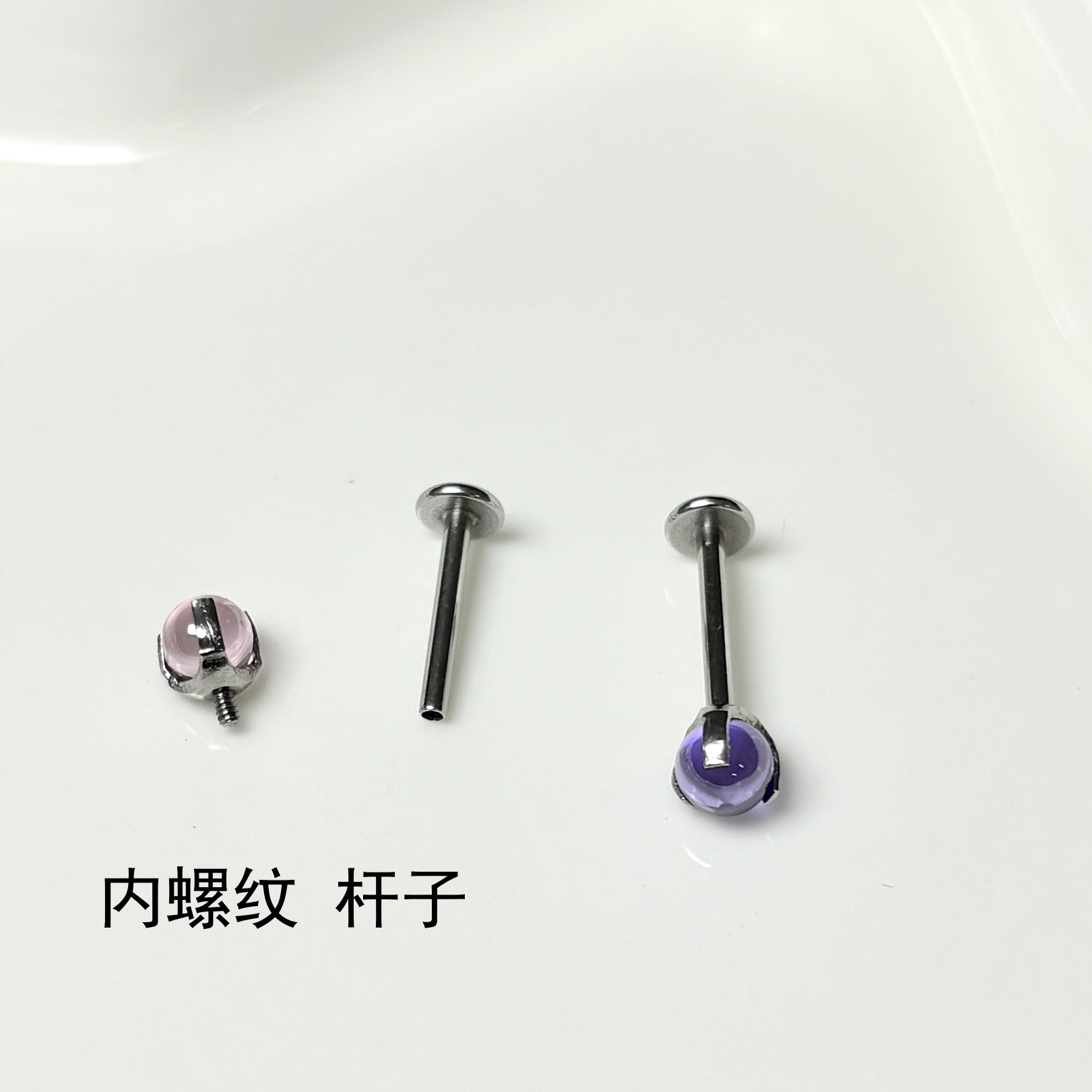 Silver pointed spike labret stud material detail