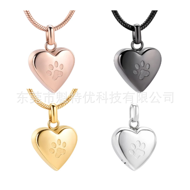 Japonés y coreano nuevo collar de acero de titanio de las mujeres no se desvanece en forma de corazón pata de impresión conmemorativa gato y perro mascota cinerario ataúd colgante impermeable