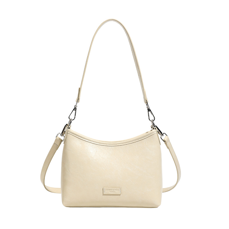 Bolsa de brazo popular diaria coreana de nicho para mujeres 2026 nueva moda mochila de hombro para viajar bolso cuadrado simple