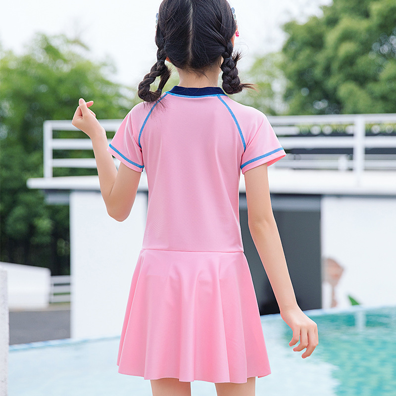 Traje de baño de los niños nuevo lindo estilo deportivo de una pieza princesa vestido niña medio y niños grandes con almohadilla de pecho caliente primavera traje de baño
