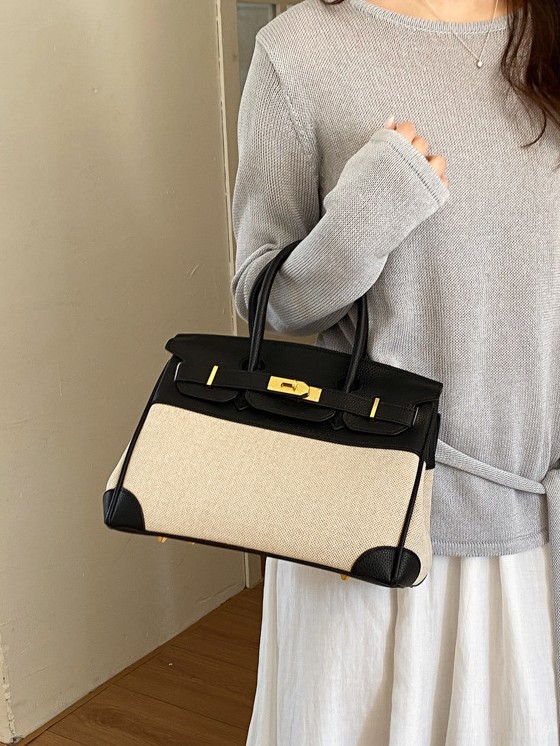Cross-border nuevo bolso portátil de platino para mujeres 2026 moda lino empalme color contraste mochila de hombro
