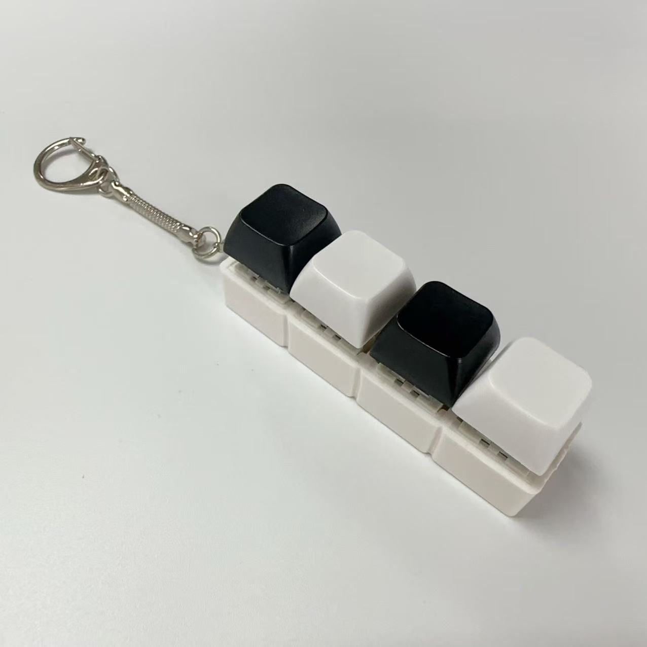 Four-button white shell - black & white