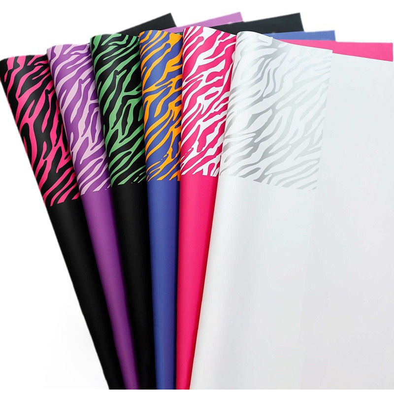 Fábrica de fiestas de flores al por mayor leopardo transfronterizo papel de embalaje de flores nuevo ramo de flores papel de embalaje de regalos florista