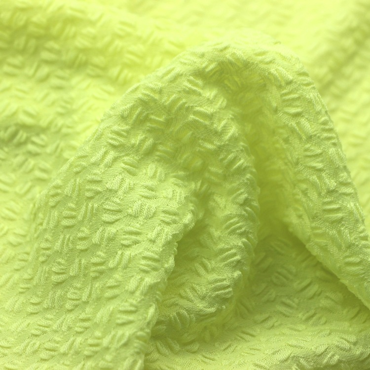 提花咖啡豆单面布汗布服装面料针织纬编全涤氨纶起皱泡泡单面布料