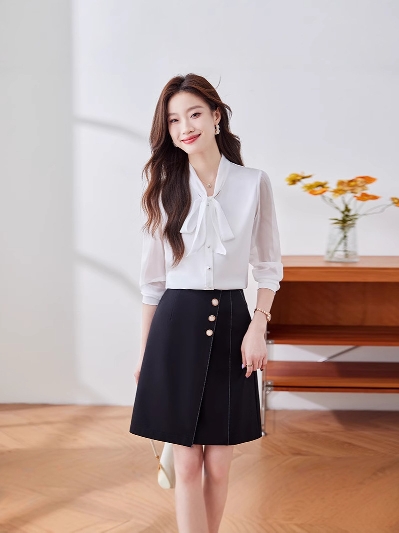 White long-sleeve with bow
