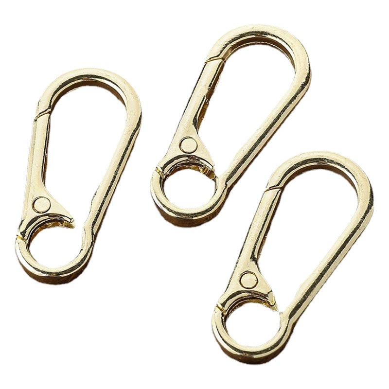 Mosquetón dorado hebilla de cintura creativa accesorios de llavero de coche hebilla colgante chapada en oro Yiwu pequeña fábrica de productos básicos al por mayor