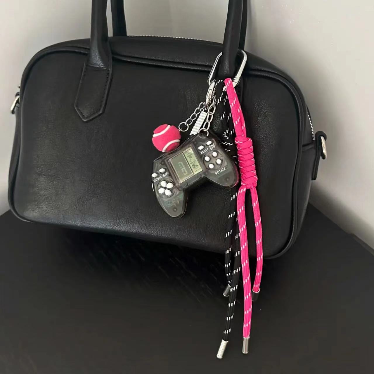 Game console tennis black rose rope m style pendant