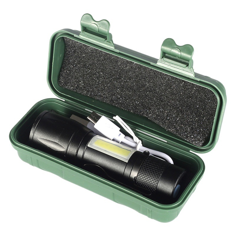 Fábrica al por mayor mini linterna súper brillante de largo alcance al aire libre recargable fuerte luz zoom LED aleación de aluminio 511 pequeña linterna