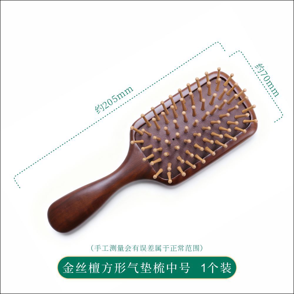 Sandalwood Scalp Massage Comb Set with Drawstring Storage Bag for Head Meridian Grooming and Gift Giving in use