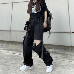 取り外し可能な2つの足のスーツのズボンの女性の夏の薄いタイプの黒いズボンの腰がゆったりしています。