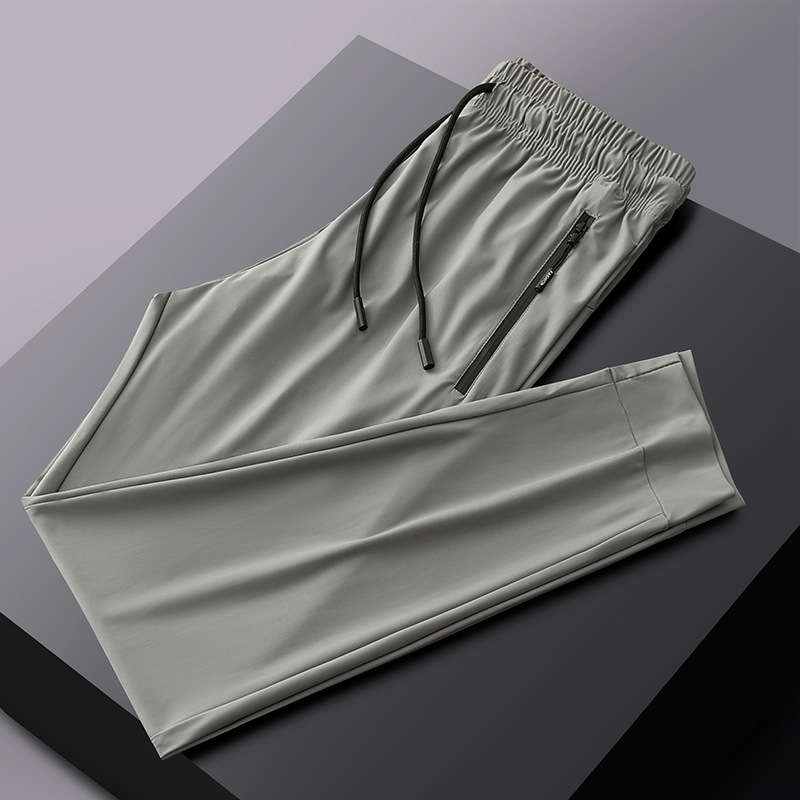 2025 verano pantalones deportivos de talla grande pantalones de hombre pantalones de aire acondicionado pantalones de seda de hielo de secado rápido pantalones de pierna recta gorda al por mayor
