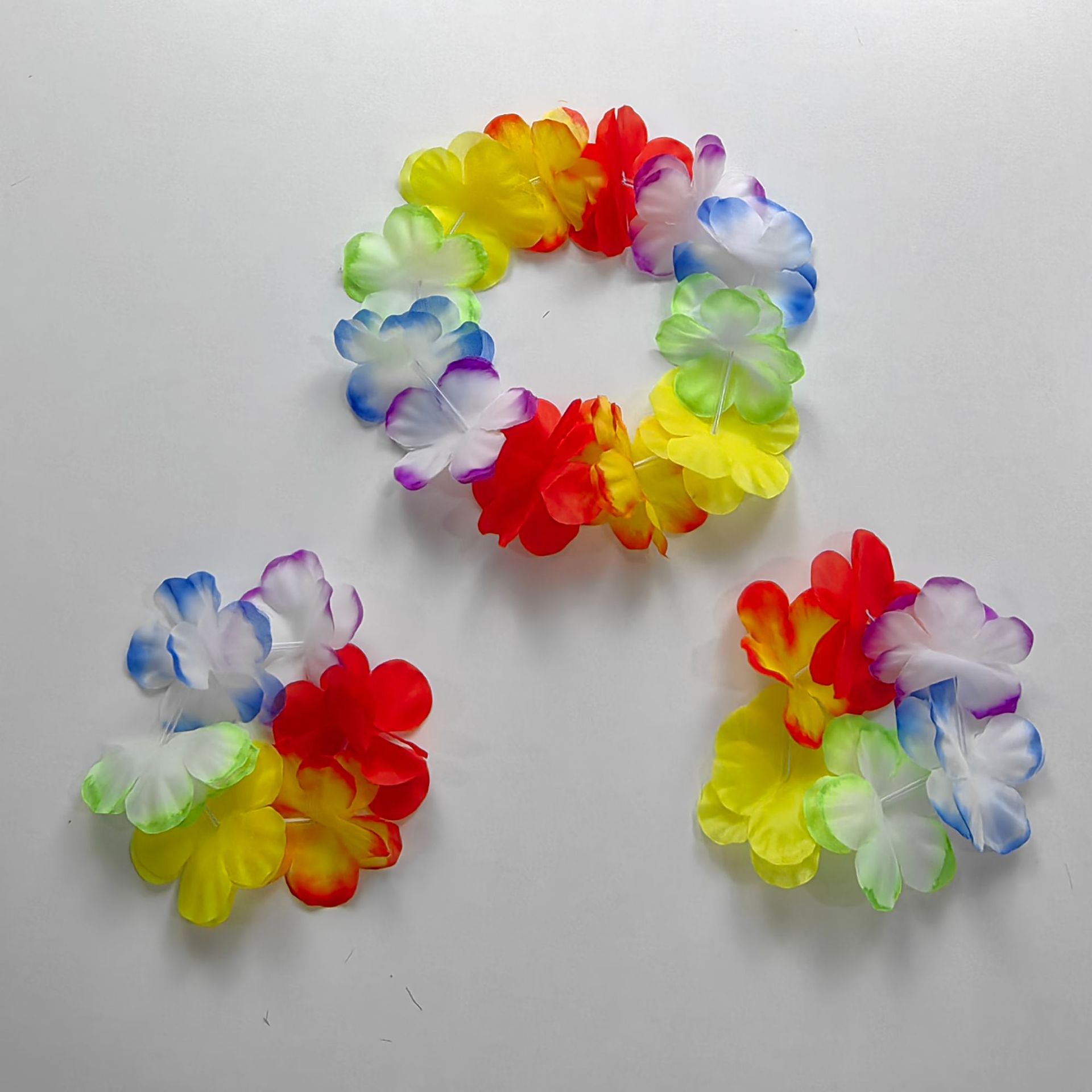 Garland guirnalda hawaiana pulsera fiesta de cuatro piezas conjunto creativo boda danza rendimiento apoyos flor artificial al por mayor