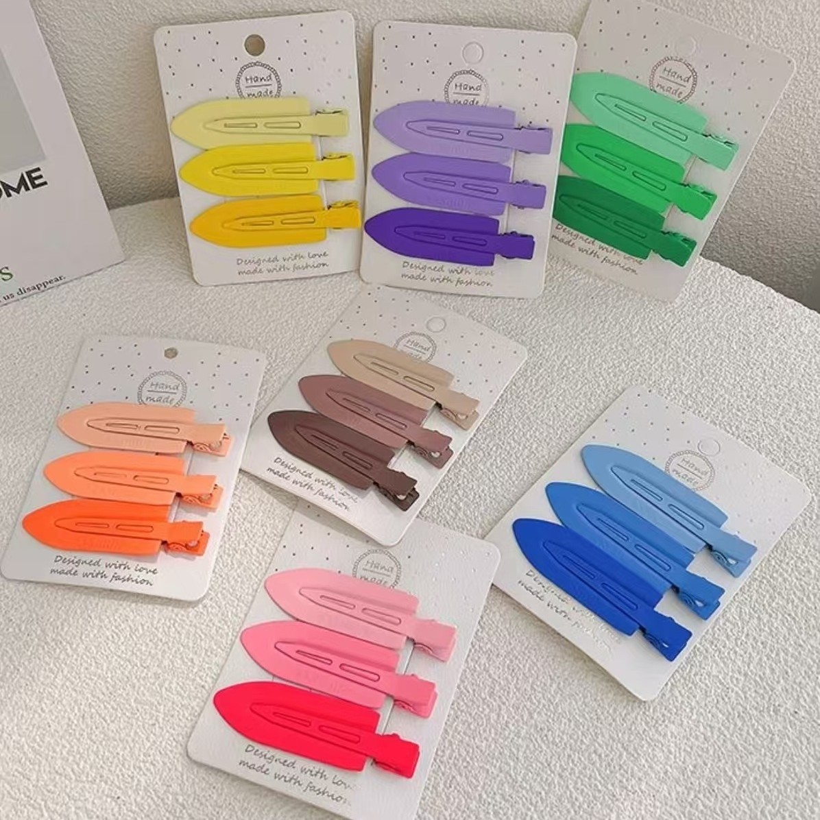 Korean-style candy-colored duckbill clips, bangs clips, side clips, makeup hair clips, seamless hair clips, girls' hair accessories wholesale.