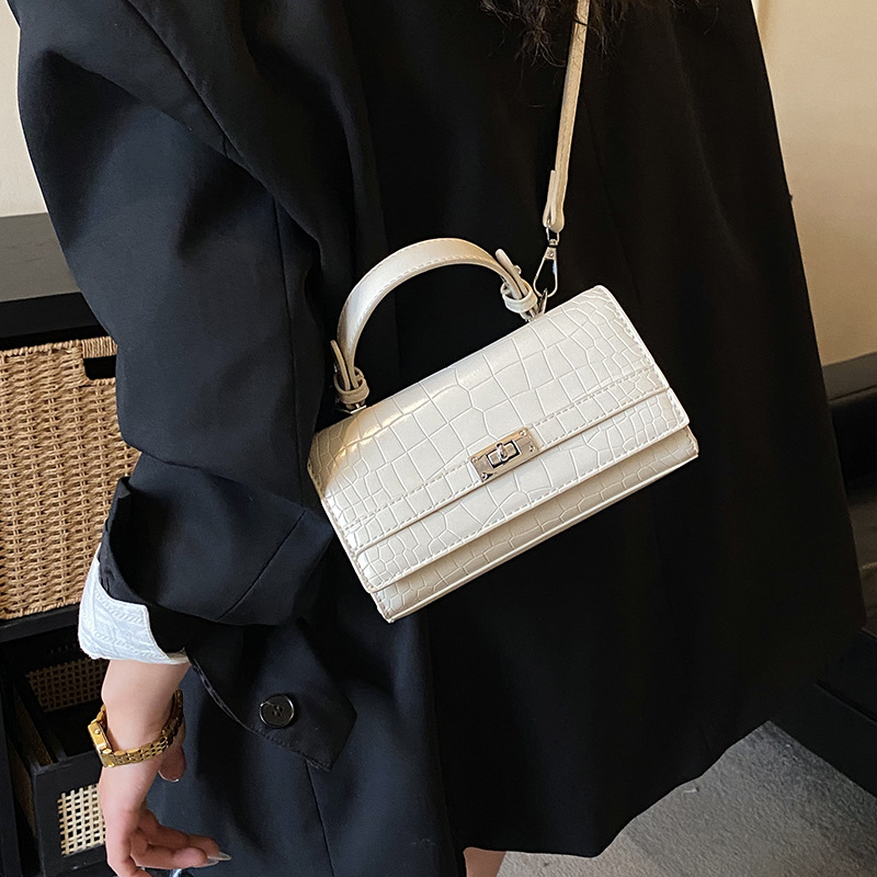 Sentimiento diario de cocodrilo Kelly bolso para mujeres 2026 nuevo diseño de nicho retro bolso de mano de viaje mochila de hombro