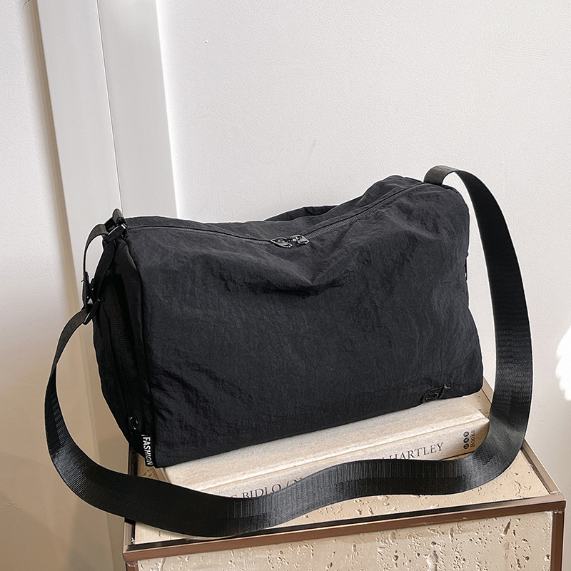 Moda coreana ligera simple ocio de gran capacidad de hombro mochila de caída de otoño nuevo estilo de alta sensación bolso de mano