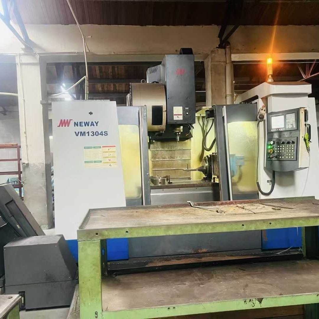 处理二手纽威VM1304S立式加工中心主电机功率15刀库:24把