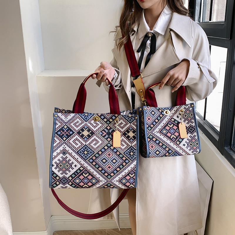 Gran capacidad lona Plaid Portátil Bolsa femenina 2024 transfronteriza primavera nuevo trabajo viajero hombro bolsa de mensajero