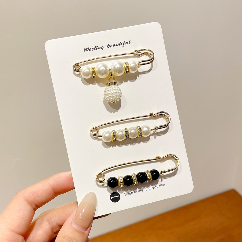 Falda con hebilla de cintura de perlas, circunferencia de cintura grande, cambio de artefacto, hebilla anti-luz, ropa, broche de diseño fijo